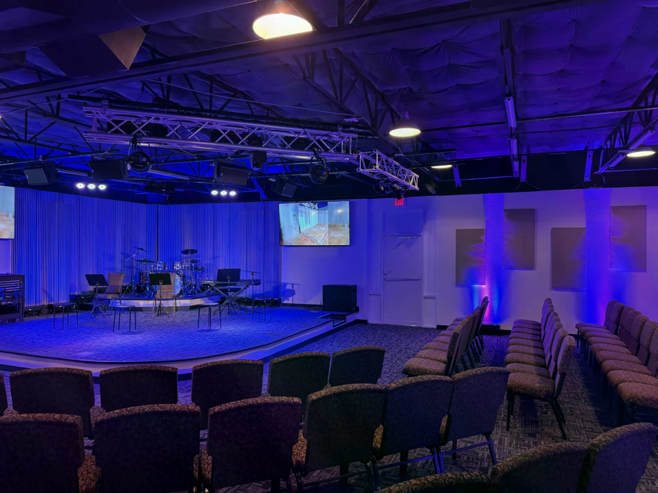 One Faith Community Church — finished auditorium with stage, rigging and projection